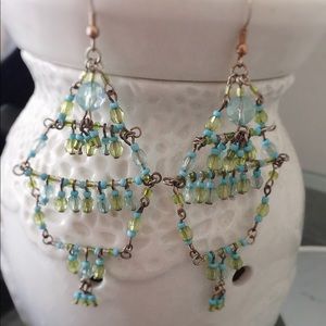 earrings designed with green and turquoise beads.
